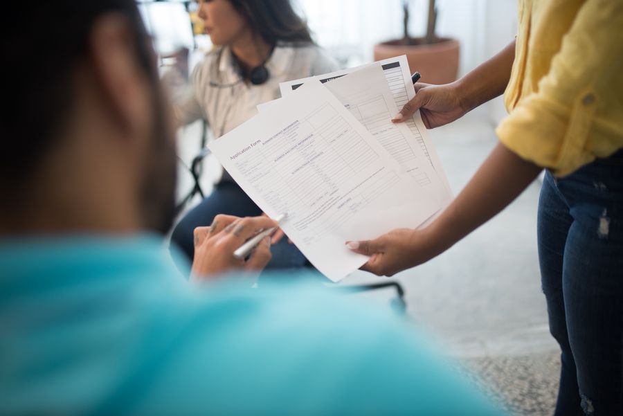 people reviewing documents