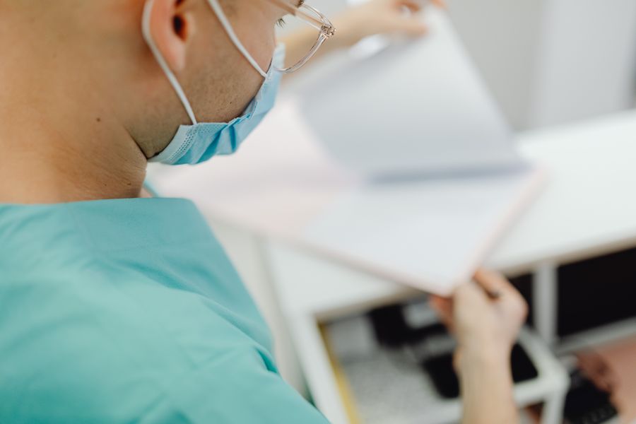 doctor reviewing document