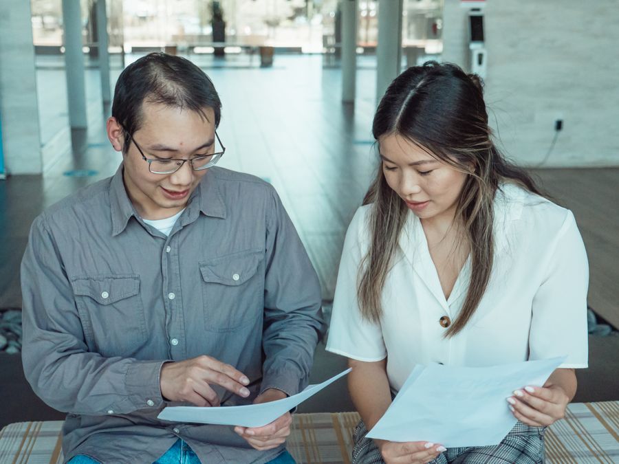 people reviewing documents