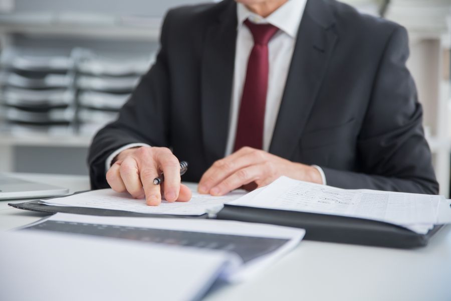 manager reviewing documents