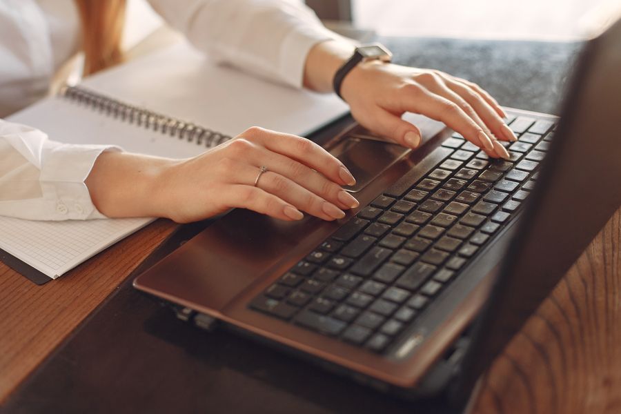 person typing resume